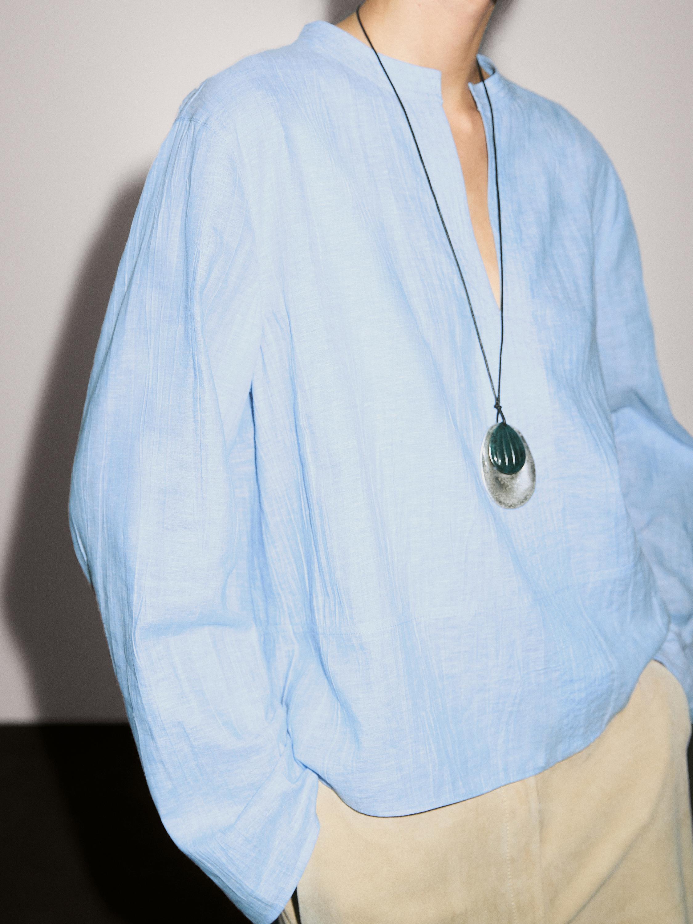 Blouse lin coutures apparentes